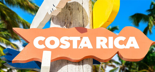 Picture of a Costa Rica sign in San José, Costa Rica. The picture shows white letters on the beach spelling out Costa Rica.