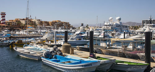 Picture of a beautiful marina in Los Sueños Resort & Marina, Jaco.  The picture several yachts and beds moored at the marina.